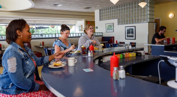 A group of women at a diner.