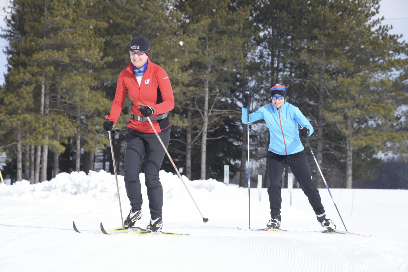 Two people on skis in the snow.