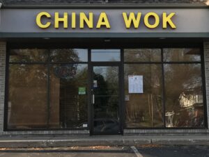 the front of a restaurant called china wok