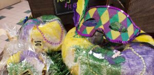 mardi gras decorations are on display in a store