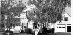 a black and white photo of a house
