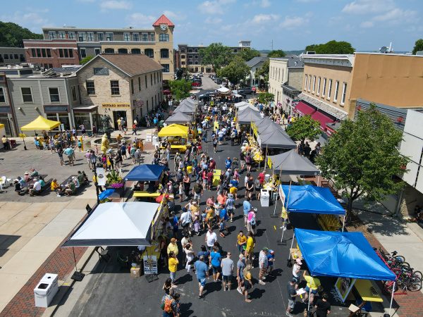 An aerial view of a crowd of people on Hubbard Avenue during the 2023 National Mustard Day.