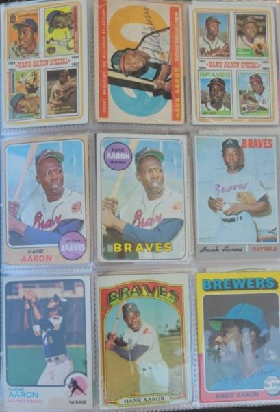 A collection of baseball cards in a box.