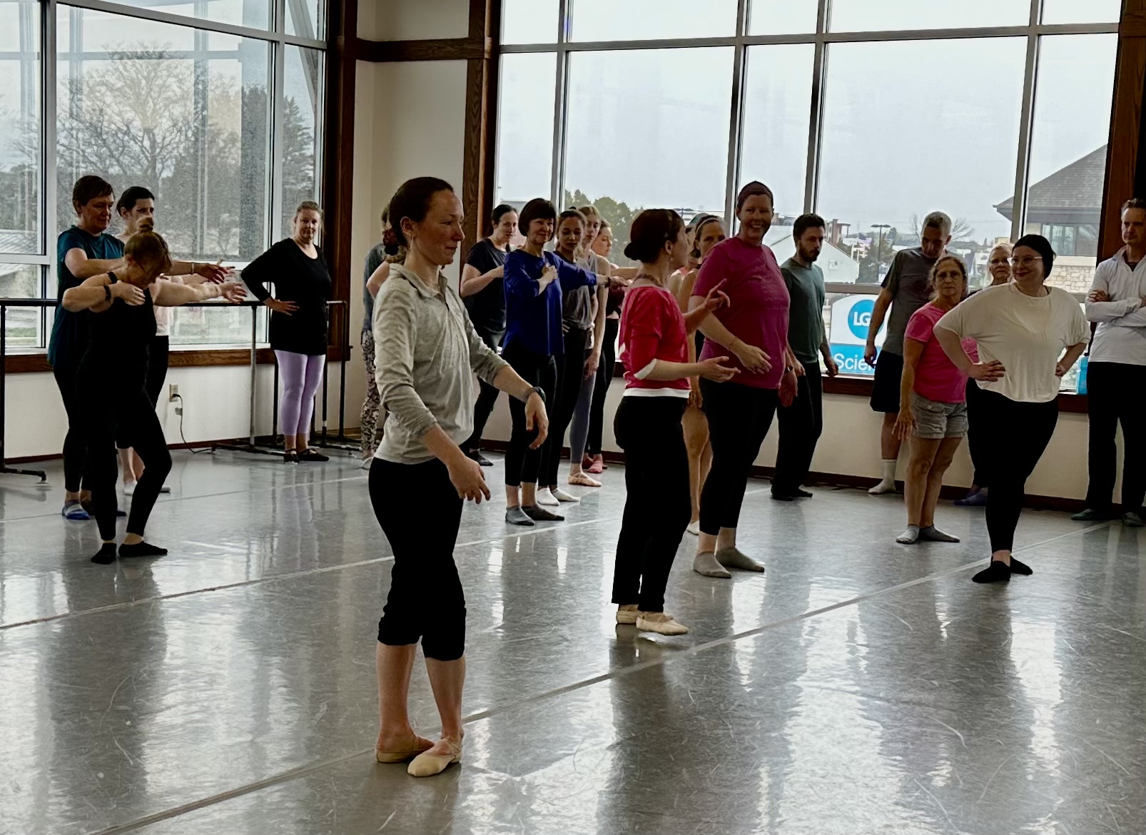 A group of people in a dance studio.