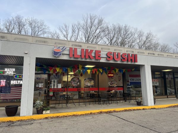 A restaurant with a sign that says like sushi.