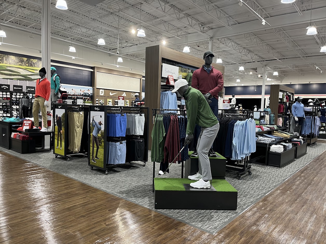 A golf store with mannequins and mannequins.