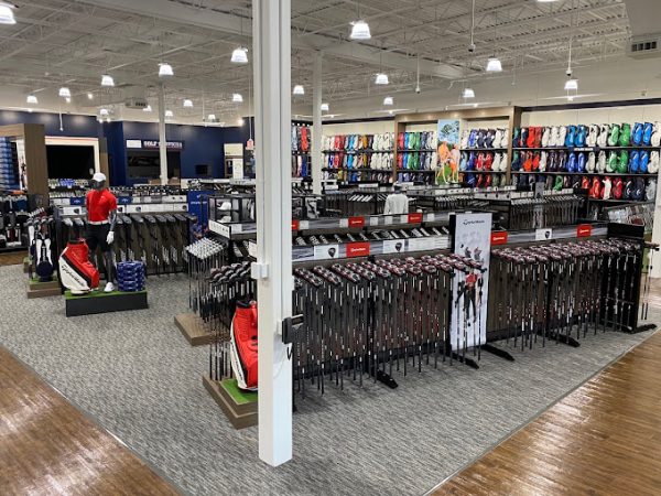 A golf store with a lot of golf equipment.