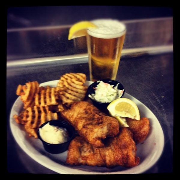 A plate of fish fry and a beer, a Wisconsin favorite.