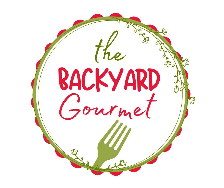 Logo for "the backyard gourmet" featuring a green fork and circular border adorned with red berries and green vines on a white background.