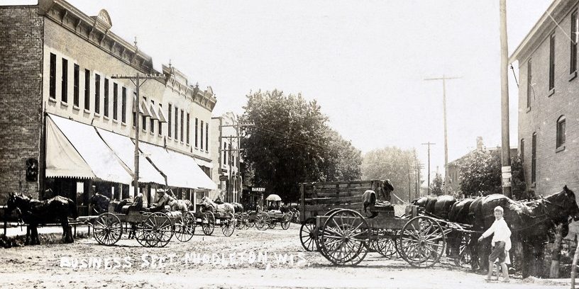 Hubbard-Ave-historic.banner a black and white photo of a horse drawn carriage